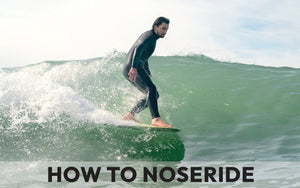 Noseriding a Surfboard