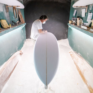 Degree 33 shaper Bill Minard custom shaping a new surfboard by hand